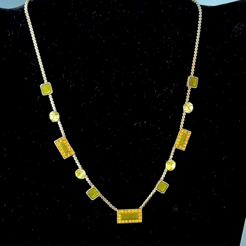 Silver statement necklace with green and amber stones